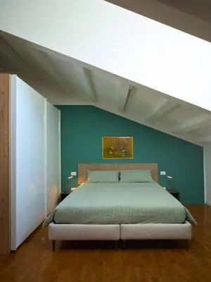 Letto o letti in una camera di Le Mura Minicase int 4
