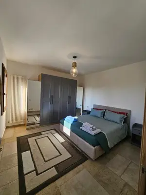 Letto o letti in una camera di Casa Loretta