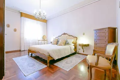 Letto o letti in una camera di QUEEN HOME Gabrielle
