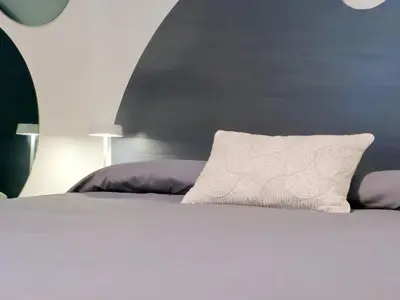 Letto o letti in una camera di San Felice's Urban Elegance