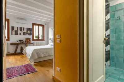 Letto o letti in una camera di Borgo Cavour Santi40