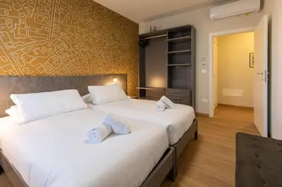 Letto o letti in una camera di Riviera MIANI 1