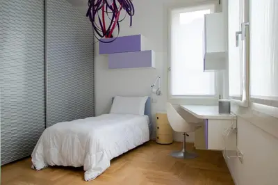 Letto o letti in una camera di Welc-ōM Palazzo Gabelli Free Parking