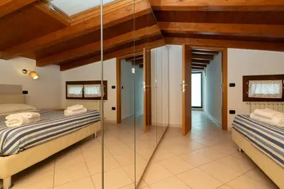 Letto o letti in una camera di Casa Lulù