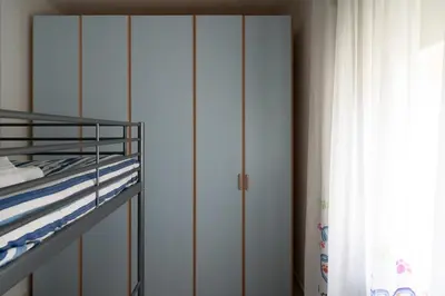 Letto o letti in una camera di Casa Lulù