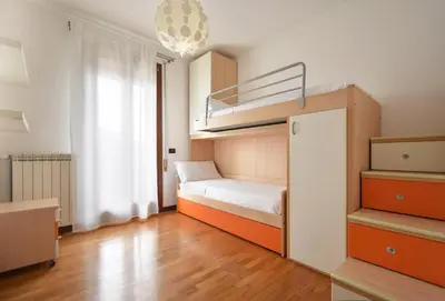 Letto o letti in una camera di Welc-ōM Tombelle