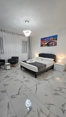 Letto o letti in una camera di Casa Riviera del Brenta