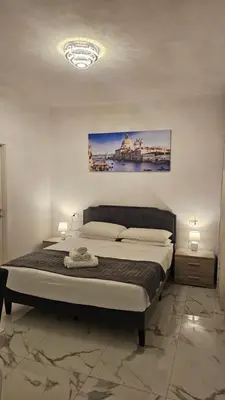 Letto o letti in una camera di Casa Riviera del Brenta