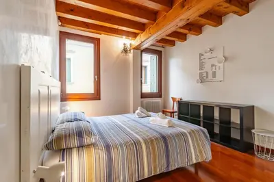 Letto o letti in una camera di GuestHost - Space & Comfort Ideal Retreat Mestre