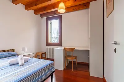 Letto o letti in una camera di GuestHost - Space & Comfort Ideal Retreat Mestre