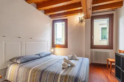 Letto o letti in una camera di GuestHost - Space & Comfort Ideal Retreat Mestre