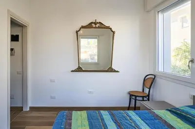Letto o letti in una camera di Villa Lucia