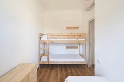 Letto o letti in una camera di Villa Lucia