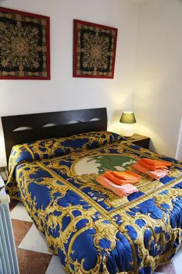 Letto o letti in una camera di Home Venice