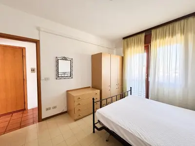 Letto o letti in una camera di Piscina, Vicino al Mare RESIDENCE EQUILIO
