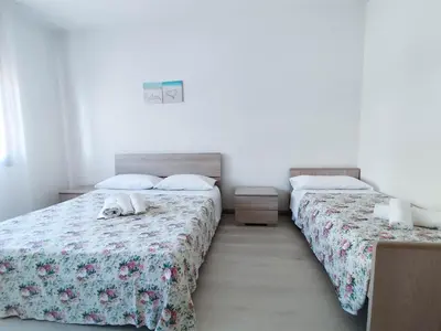 Letto o letti in una camera di Diplomatic Superior Fronte Mare