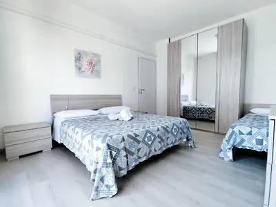 Letto o letti in una camera di Diplomatic Superior Fronte Mare
