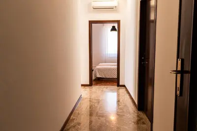 Letto o letti in una camera di Road to Venice M&N Dolo Apartment