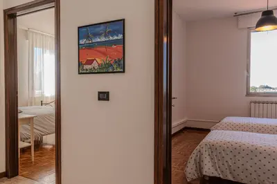 Letto o letti in una camera di Road to Venice M&N Dolo Apartment