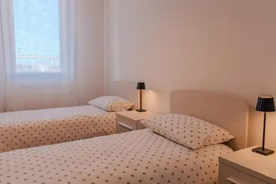 Letto o letti in una camera di Road to Venice M&N Dolo Apartment