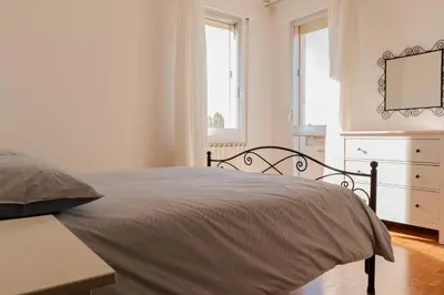 Letto o letti in una camera di Road to Venice M&N Dolo Apartment