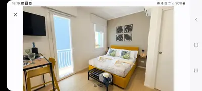 Letto o letti in una camera di Bagatela suites and flat, Suite Coccola Salina