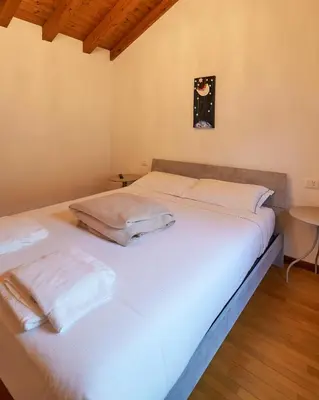 Letto o letti in una camera di HOUSE RIVA casa VENEZIA - Dolo