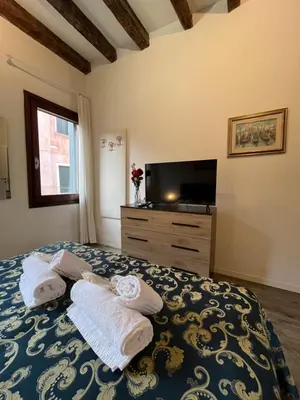 Letto o letti in una camera di Cozy apartment close to Biennale of Venice