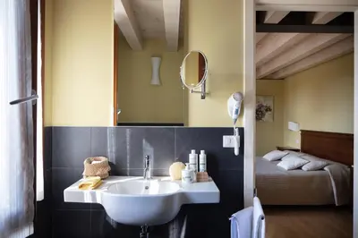 Letto o letti in una camera di Casa dei Racconti