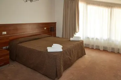 Letto o letti in una camera di Green Garden APARTMENTS