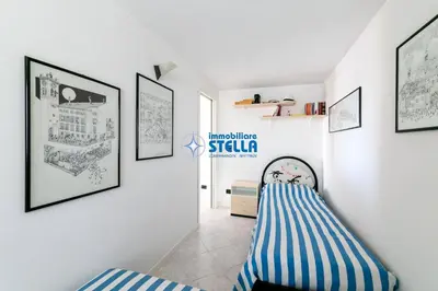 Letto o letti in una camera di Condominio London