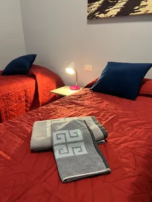 Letto o letti in una camera di Bella Meimei