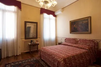 Letto o letti in una camera di Camera doppia con bagno e terrazza