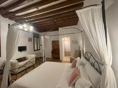 Letto o letti in una camera di Residenza Corte Antica B&B