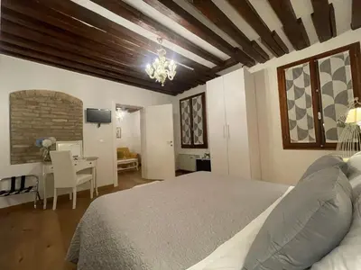 Letto o letti in una camera di Residenza Corte Antica B&B
