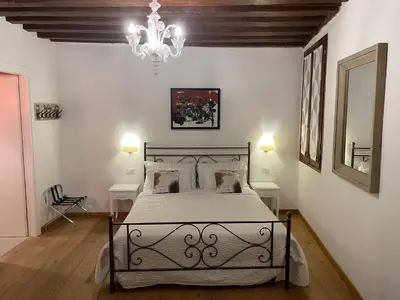 Letto o letti in una camera di Residenza Corte Antica B&B