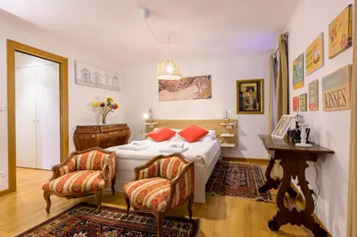 Letto o letti in una camera di Teatro alla Fenice - Bealux Srl