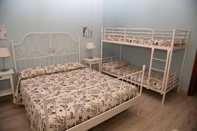 Letto o letti in una camera di Hotel Umberto
