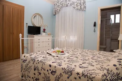 Letto o letti in una camera di Hotel Umberto