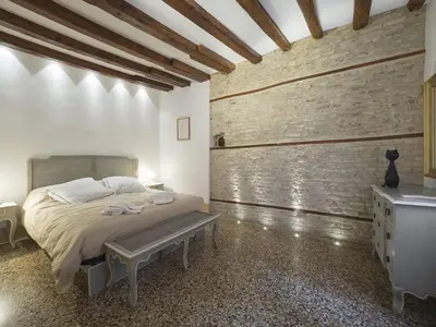 Letto o letti in una camera di Casa Margherita by Wonderful Italy