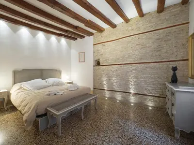 Letto o letti in una camera di Casa Margherita by Wonderful Italy