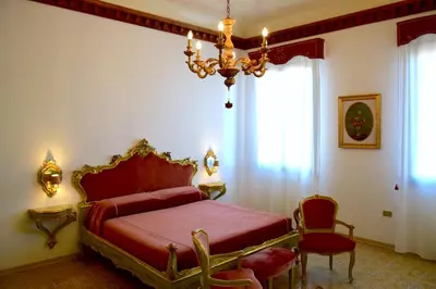Letto o letti in una camera di Casa DOGE ERIZZO