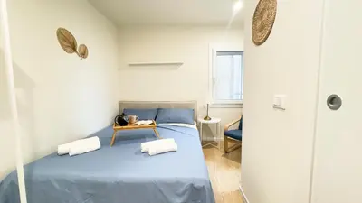 Letto o letti in una camera di Ca Egle by Ca-Sa Check