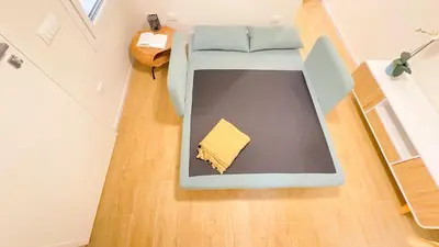 Letto o letti in una camera di Ca Egle by Ca-Sa Check