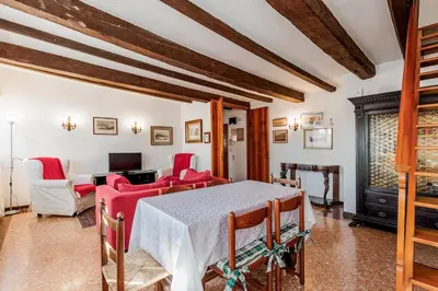 Area soggiorno di Best view in Venice! Charming apartment with private roof terrace