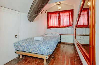 Letto o letti in una camera di Best view in Venice! Charming apartment with private roof terrace