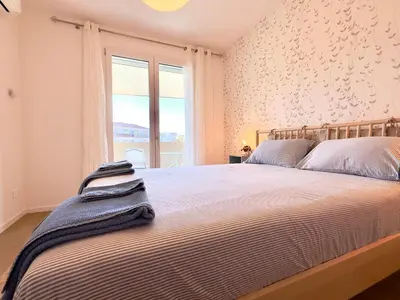 Letto o letti in una camera di 20 min Venezia Modern Apartament with terrace