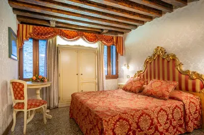 Letto o letti in una camera di Casa Guggenheim