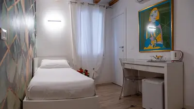 Letto o letti in una camera di Hermes Venice
