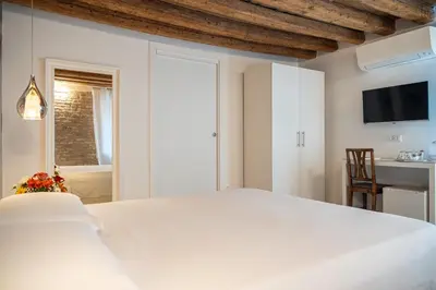 Letto o letti in una camera di Hermes Venice